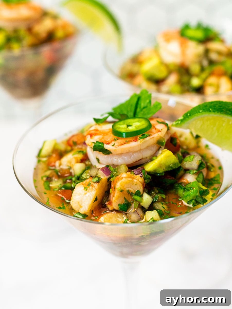 Authentic Mexican Shrimp Cocktail Recipe — Zesty Seafood Ceviche 7 Mexican shrimp cocktail in a martini glass