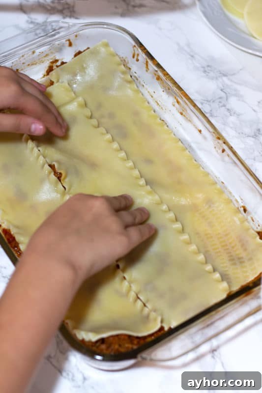 Classic Homemade Lasagna Recipe for Rich, Cheesy Layers 11 Lasagna layers being assembled.