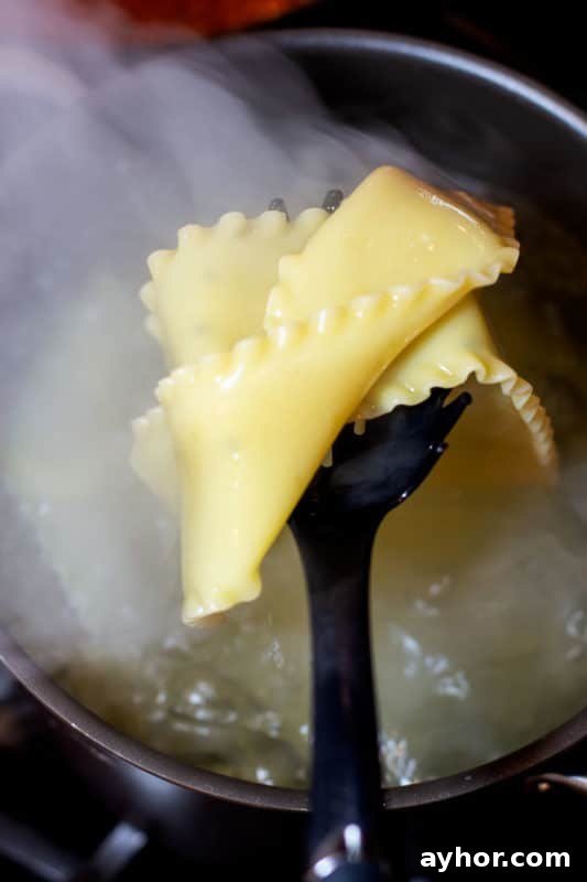 Classic Homemade Lasagna Recipe for Rich, Cheesy Layers 9 Cooked lasagna noodles draining.