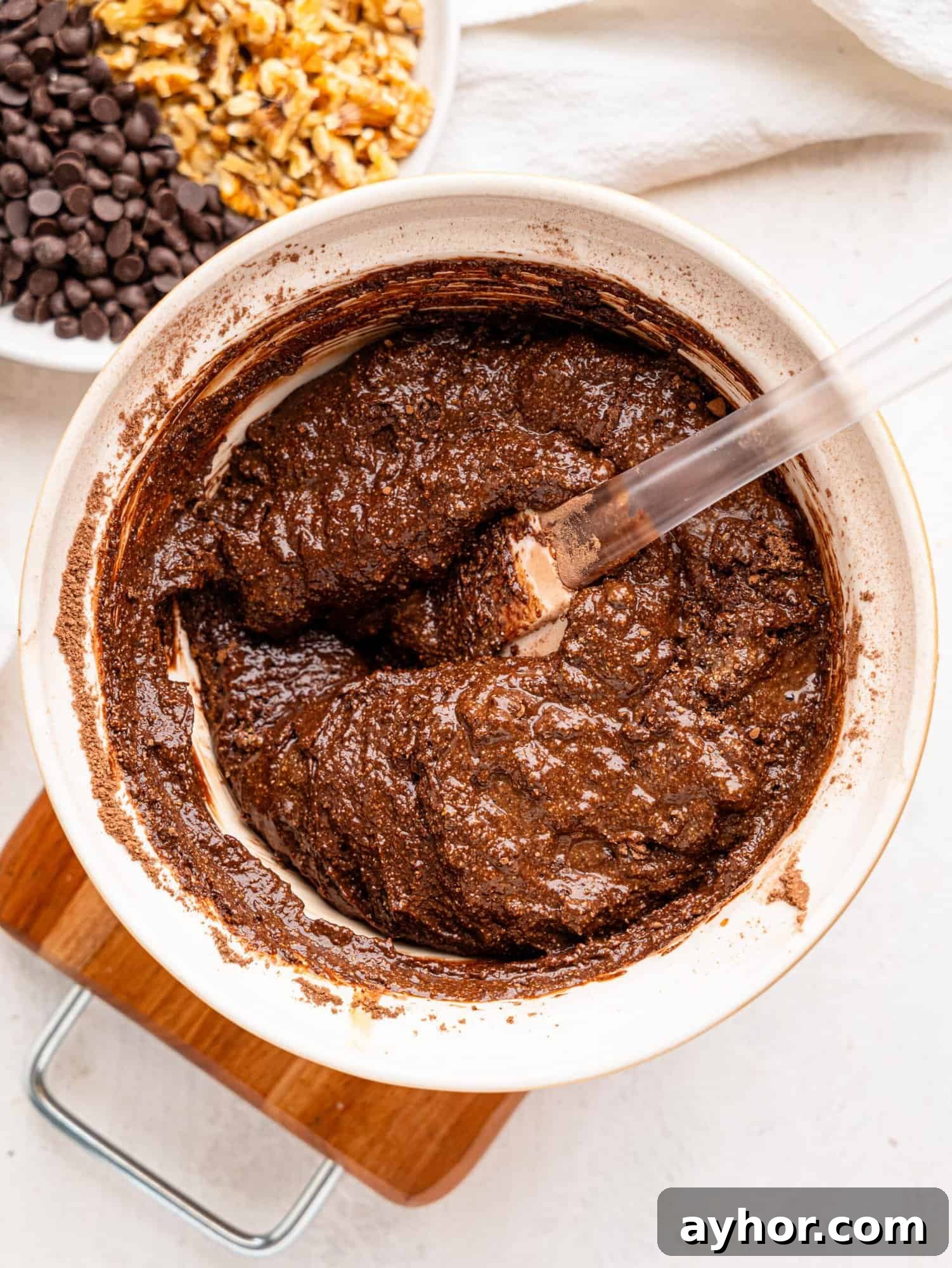 Cottage cheese brownie batter in a mixing bowl.
