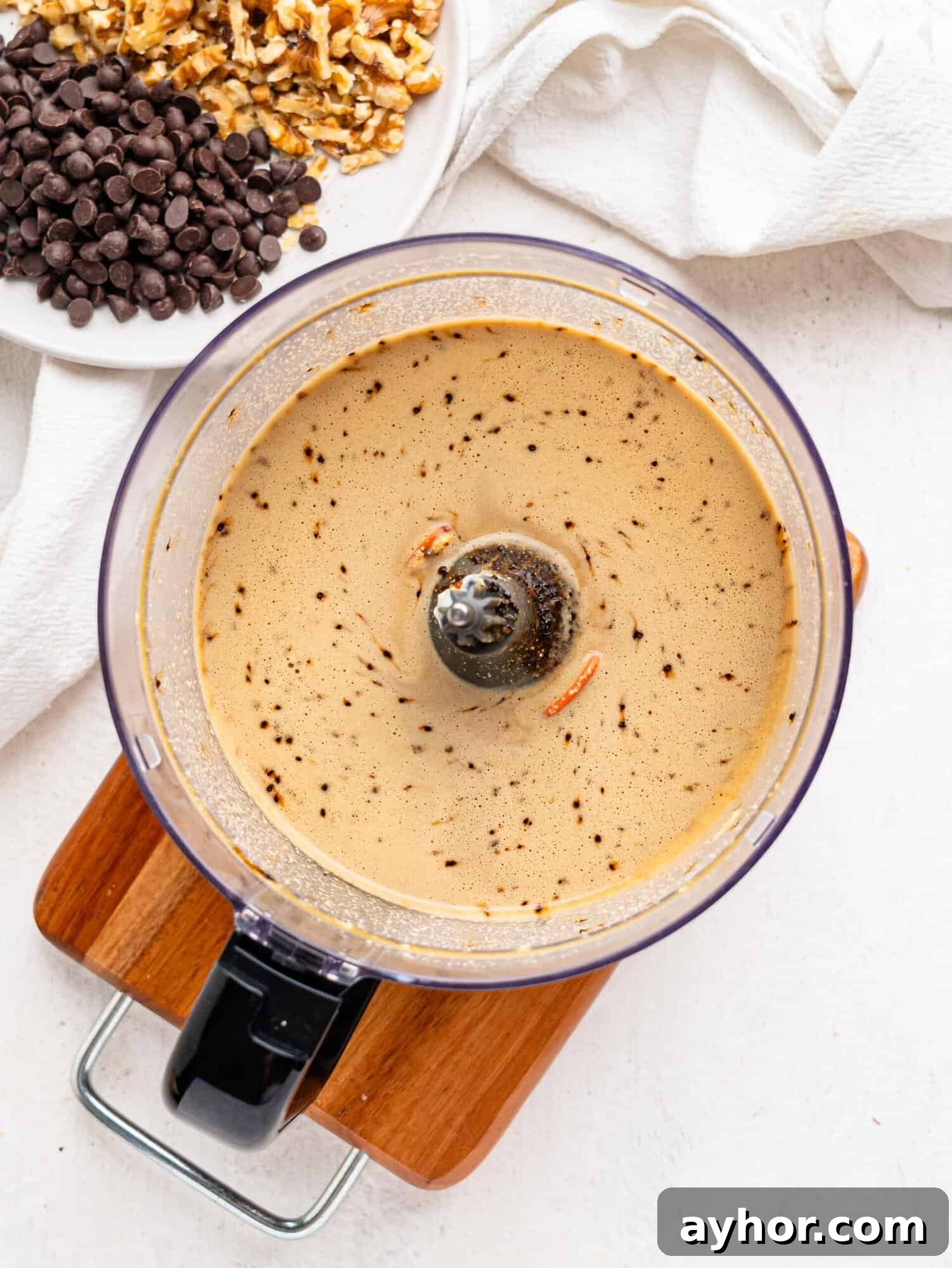 Blended wet ingredients in a food processor.