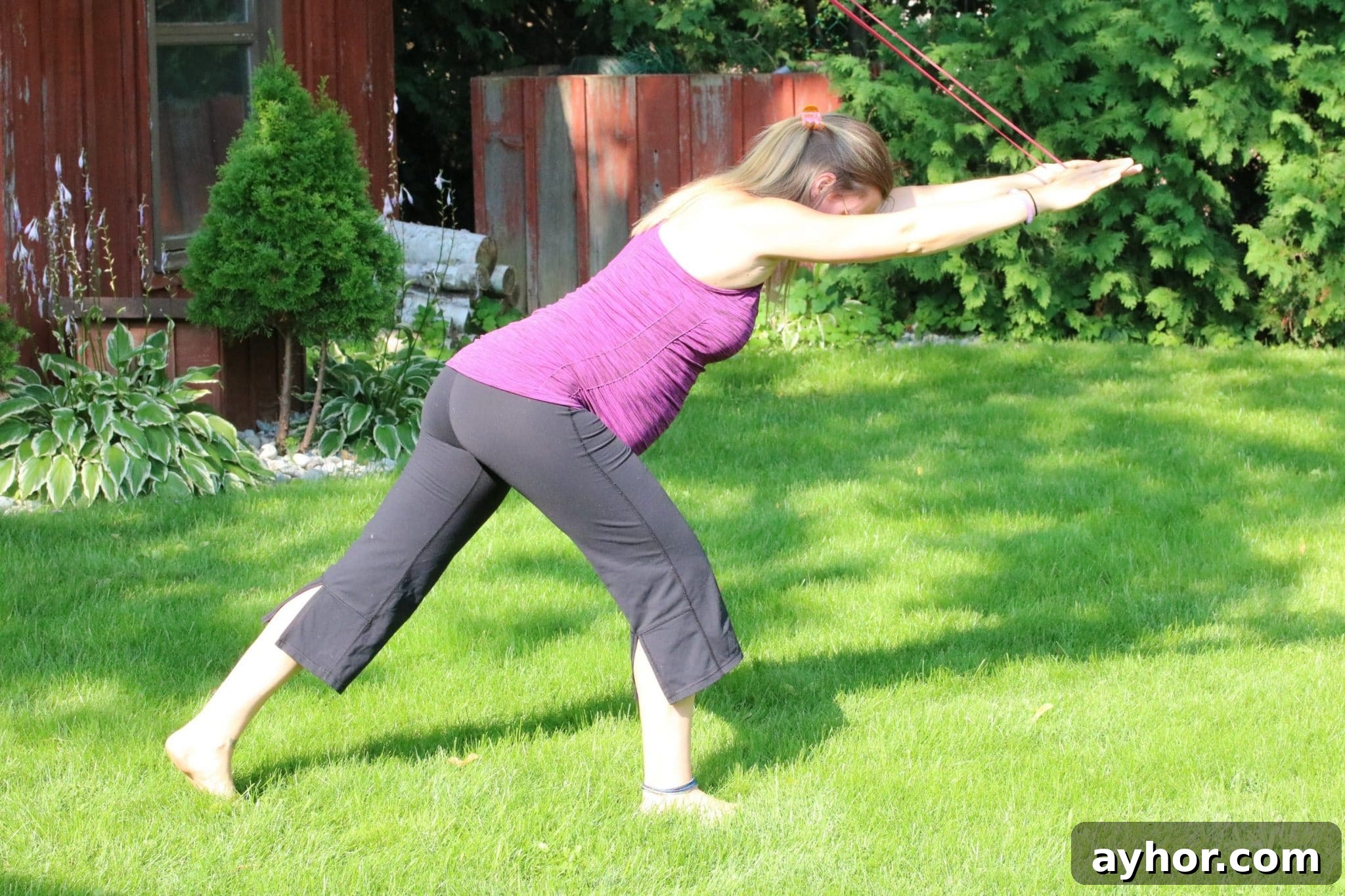 Prenatal Full-Body Strength Routine for Expecting Moms 5 Pregnant woman demonstrating overhead tricep extension