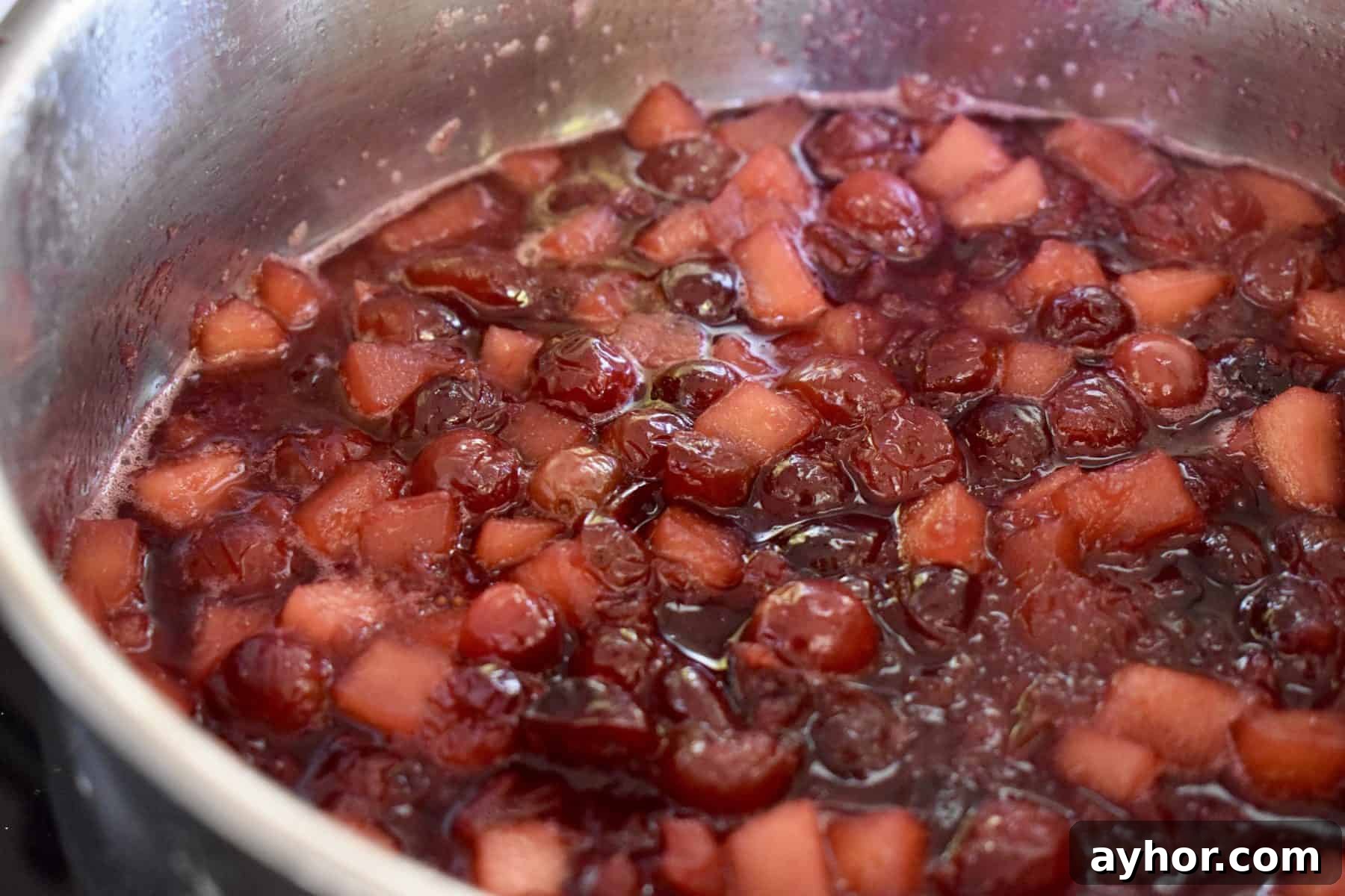 Cranberry Pineapple Sauce Recipe for Holiday Side Dish 7 The final product in a saucepan.