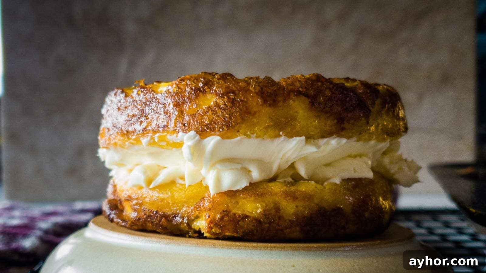 A picture of a two Ingredient English Muffins with cream cheese.