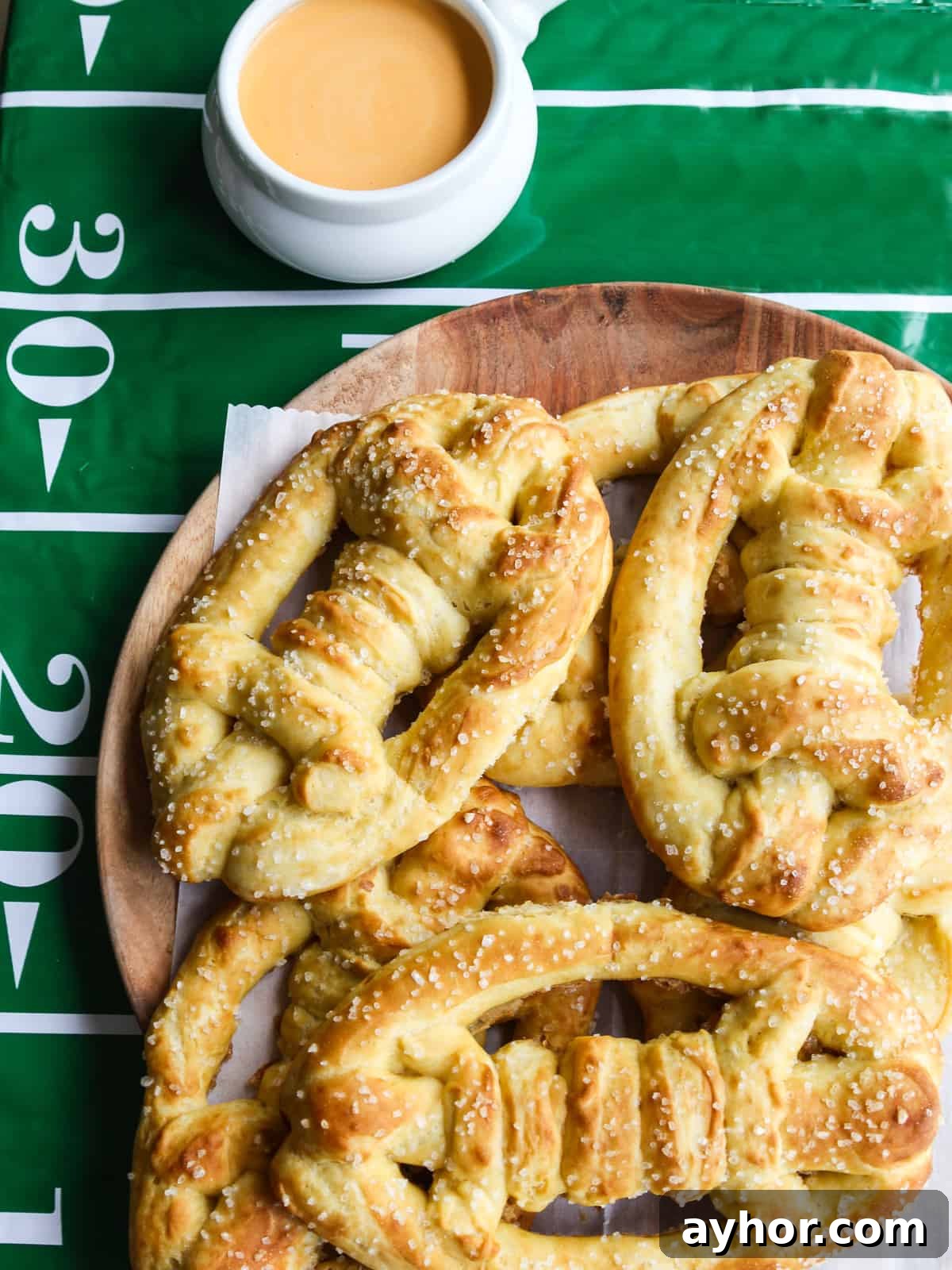 Football-shaped pretzels with beer cheese dip