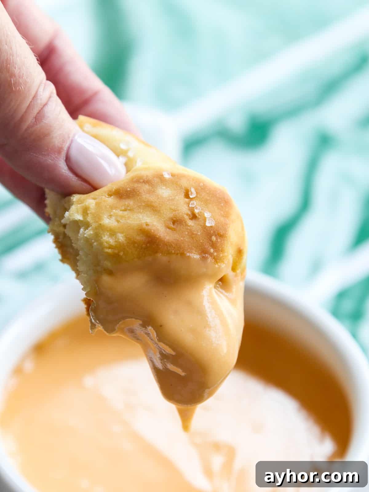 Beer cheese dip on pretzel