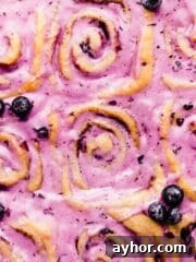 blueberry cinnamon rolls with blueberry cream cheese glaze