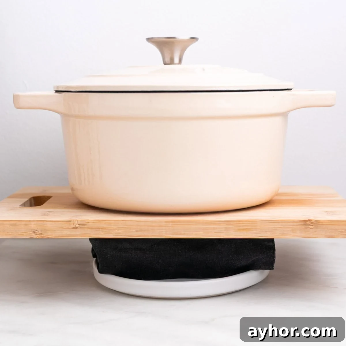 Grilled BBQ Tofu Recipe: Smoky, Glazed Plant-Based Dish 4 Tofu being pressed with a kitchen towel and a heavy pot on top