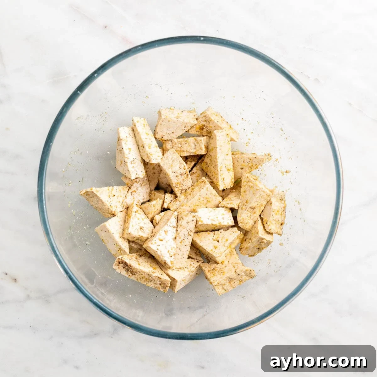 Grilled BBQ Tofu Recipe: Smoky, Glazed Plant-Based Dish 6 Tofu triangles coated with olive oil, garlic powder, salt, and black pepper