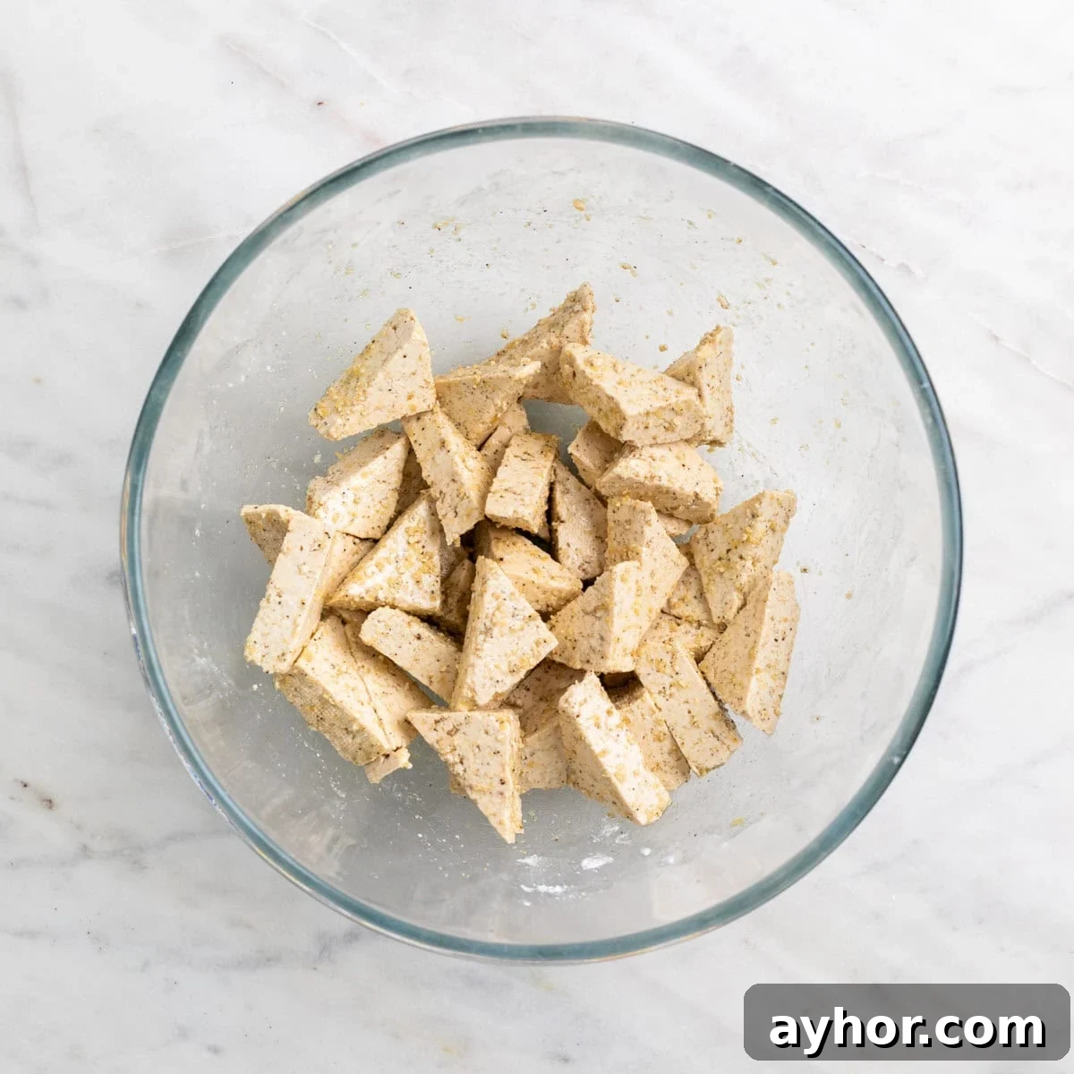 Grilled BBQ Tofu Recipe: Smoky, Glazed Plant-Based Dish 7 Tofu triangles coated with cornstarch and seasonings