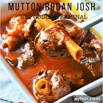 Goat Rogan Josh served in a white tray.