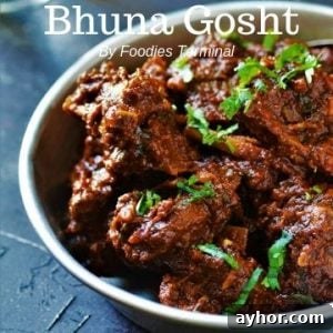 Bhuna Gosht cooked with Goat meat garnished with cilantro