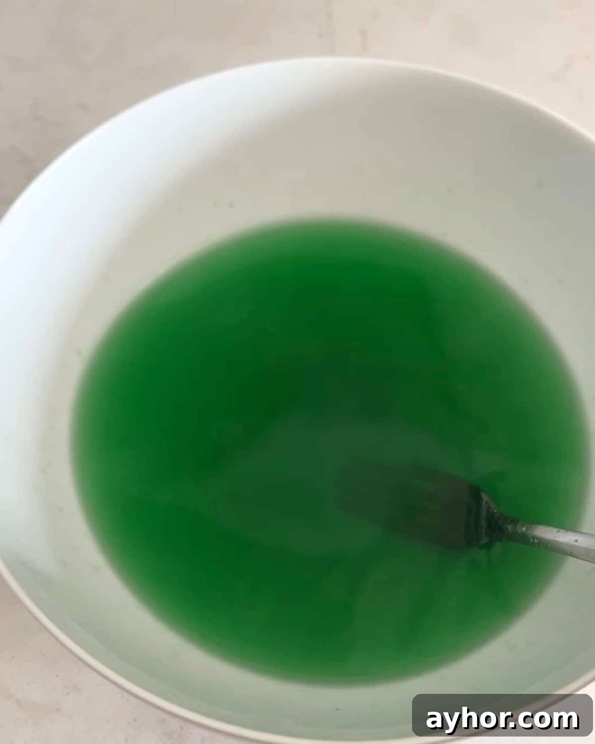 WeightWatchers Key Lime Pie Recipe with Jell-O Twist 4 Key lime jello dissolved in water.