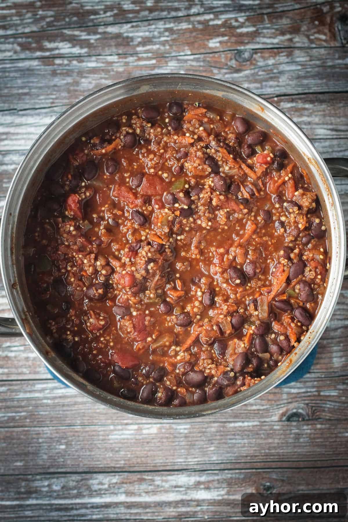 A pot of black bean quinoa chili after simmering on the stove.