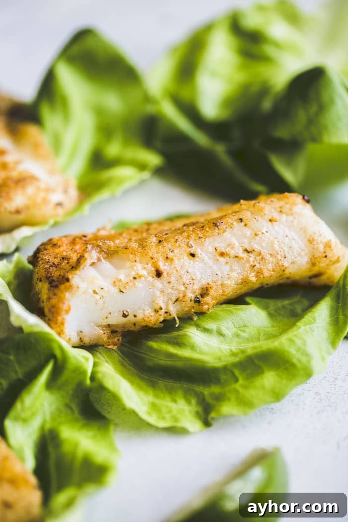 Paleo Cod Lettuce Wraps: Low-Carb Seafood Recipe 4 fried cod on top of lettuce