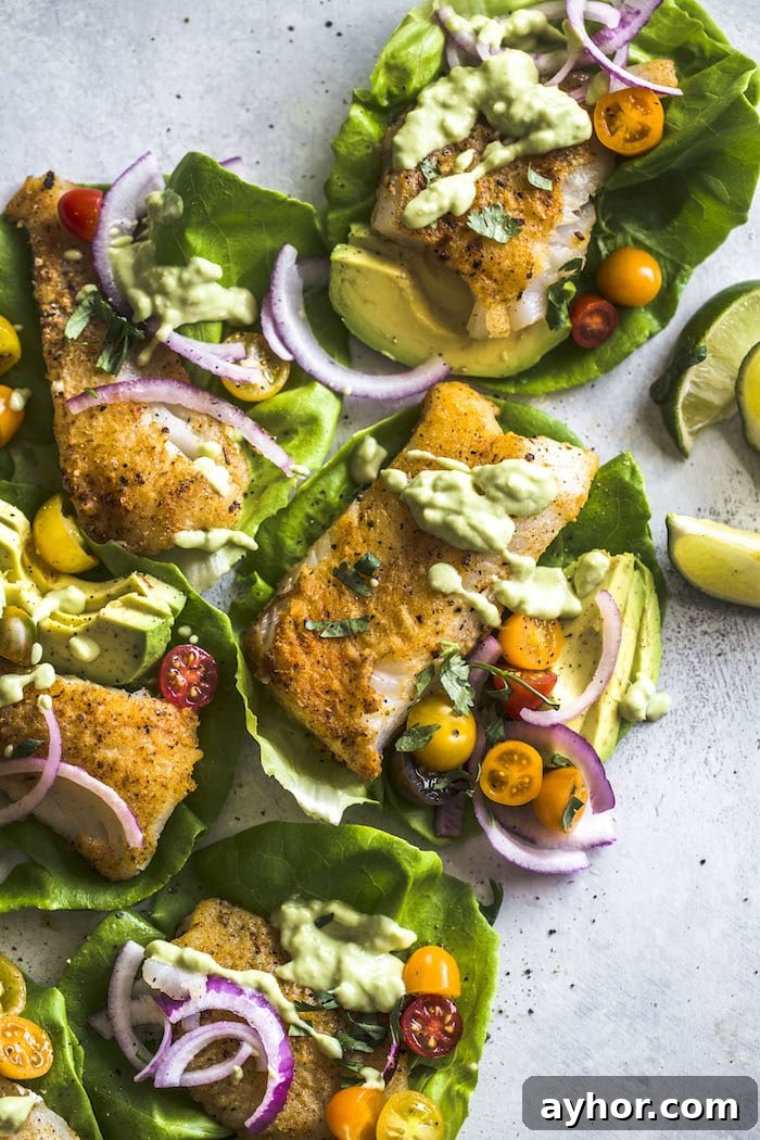 Paleo Cod Lettuce Wraps: Low-Carb Seafood Recipe 5 fried fish on top of lettuce