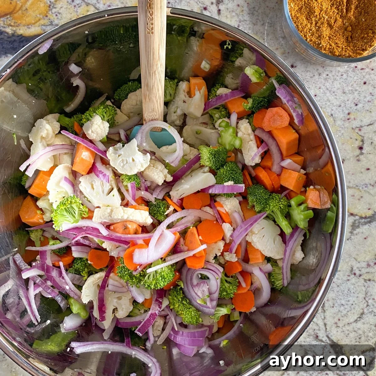 Homemade Chicken Shawarma Vegetable Wrap Recipe 3 vegetables in a bowl with oil.