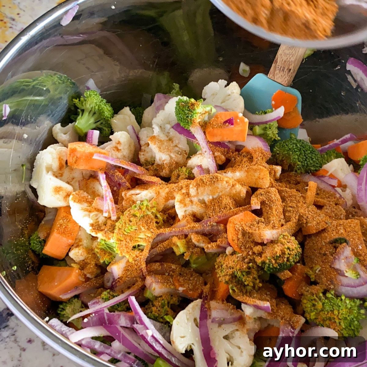 Homemade Chicken Shawarma Vegetable Wrap Recipe 4 vegetables in a bowl with spices.