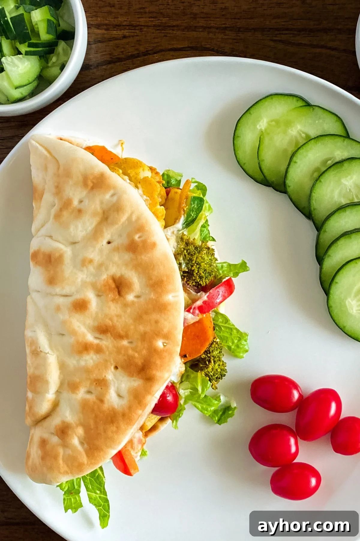 Homemade Chicken Shawarma Vegetable Wrap Recipe 6 chicken wrap on a plate.