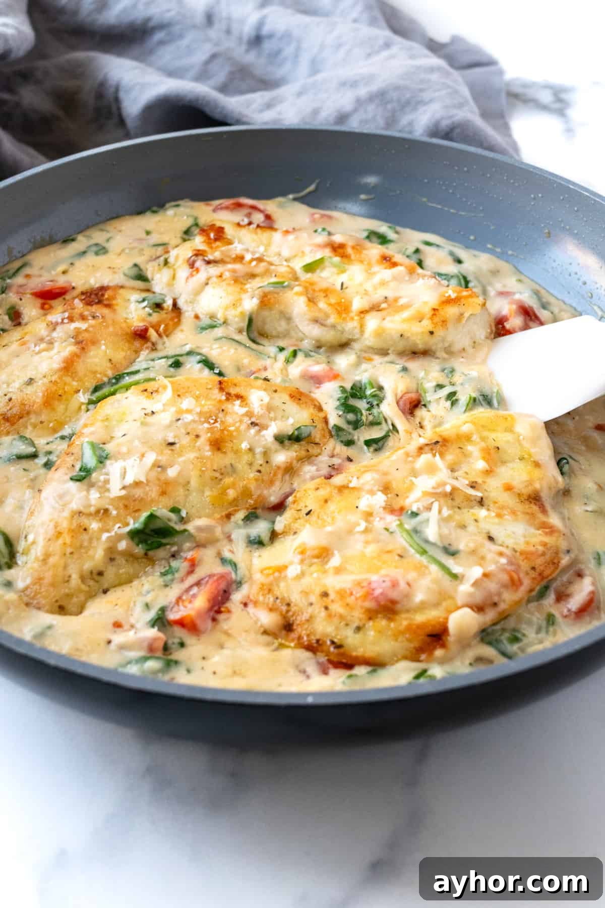 Creamy Chicken Florentine with Spinach and Garlic Sauce 2 Creamy Chicken Florentine in a Skillet.