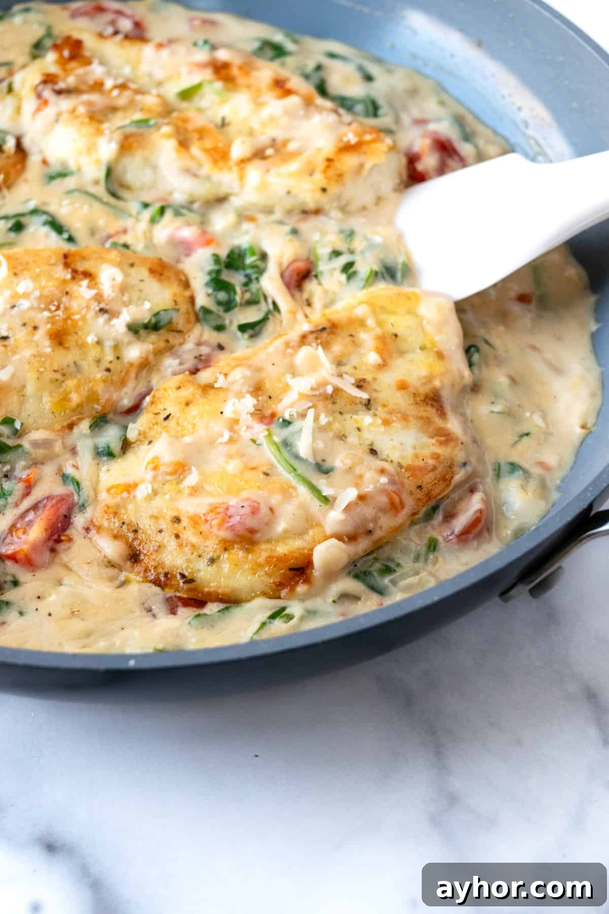 Creamy Chicken Florentine with Spinach and Garlic Sauce 8 Creamy Chicken Florentine in a Skillet.