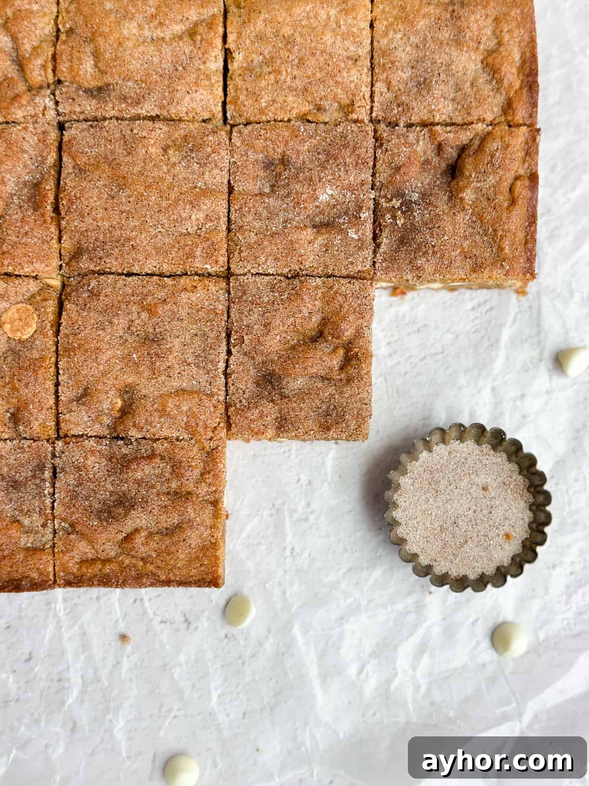 a close up of some gingerbread blondies cut up.