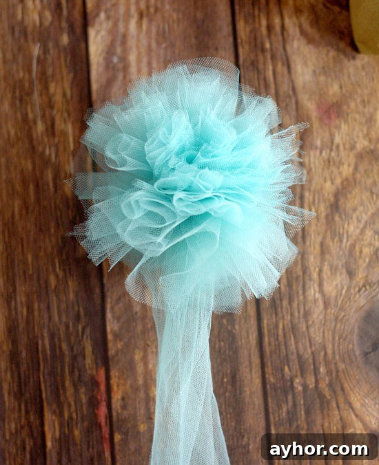 Tulle bows arranged on multiple gifts
