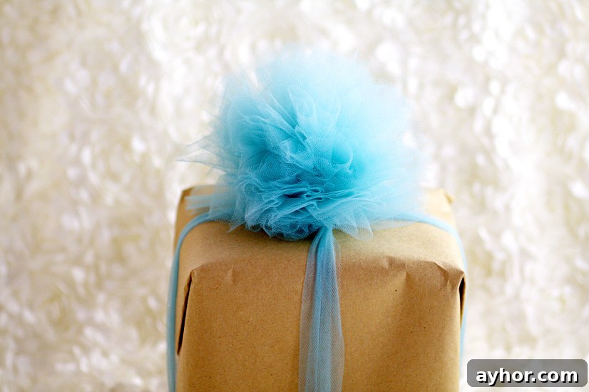 Finished gift with tulle bow and wrapped ribbon