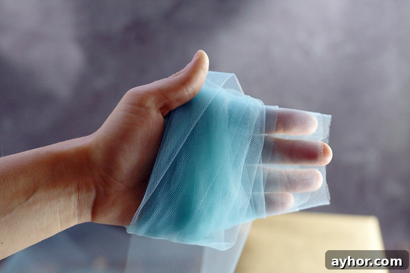 Wrapping tulle around hand to make bow loops