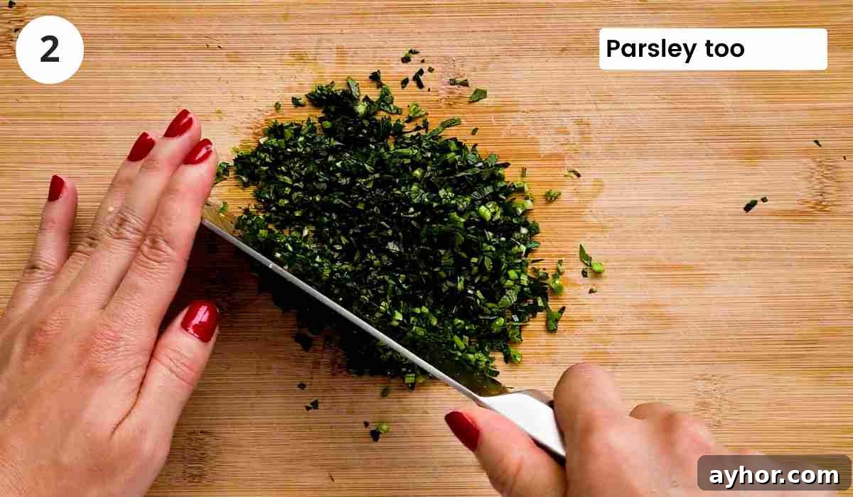 Creamy Lemon Garlic Butter Pasta Recipe for Quick Weeknight Meals 5 Fresh parsley being finely chopped with caption