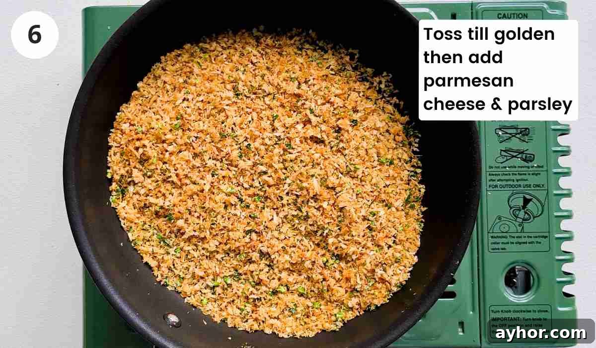 Creamy Lemon Garlic Butter Pasta Recipe for Quick Weeknight Meals 9 Golden breadcrumbs in a frying pan with caption
