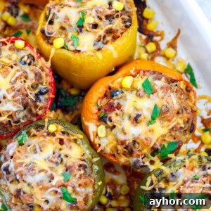 top down shot of Healthy Stuffed Peppers in a baking dish.
