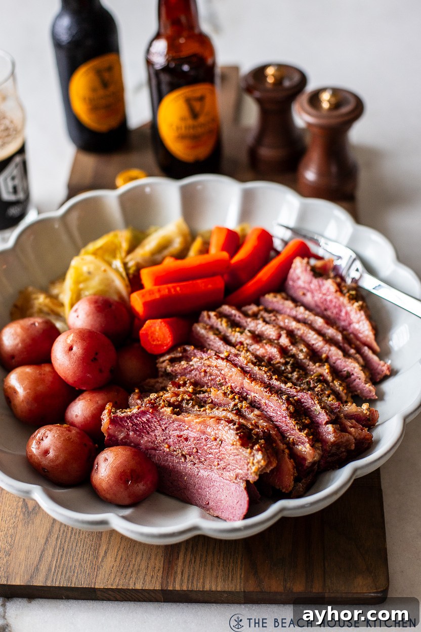 Classic Corned Beef and Cabbage Recipe for St. Patrick's Day 3 A platter of corned beef and cabbage with potatoes and carrots