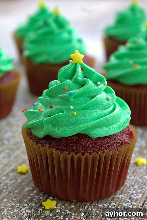Christmas Tree Frosted Cupcakes, easy and super cute technique for a festive holiday treat! - ThisSillyGirlsLife.com #ChristmasTreeCupcakes Christmas Tree Frosted Cupcakes, easy and super cute technique for a festive holiday treat! - ThisSillyGirlsLife.com #ChristmasTreeCupcakes
