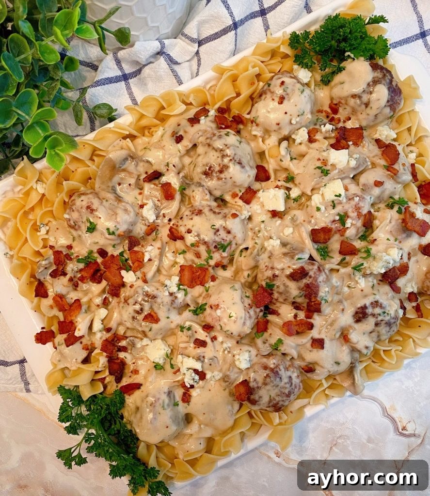 Overhead shot of the creamy bacon and beef meatballs and noodles.