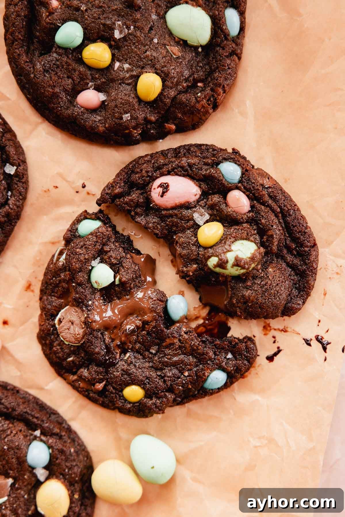 Mini Egg Cookies Recipe: Soft Cookies with Candy Eggs 3 gooey mini egg cookie with flaky salt and pool of chocolate