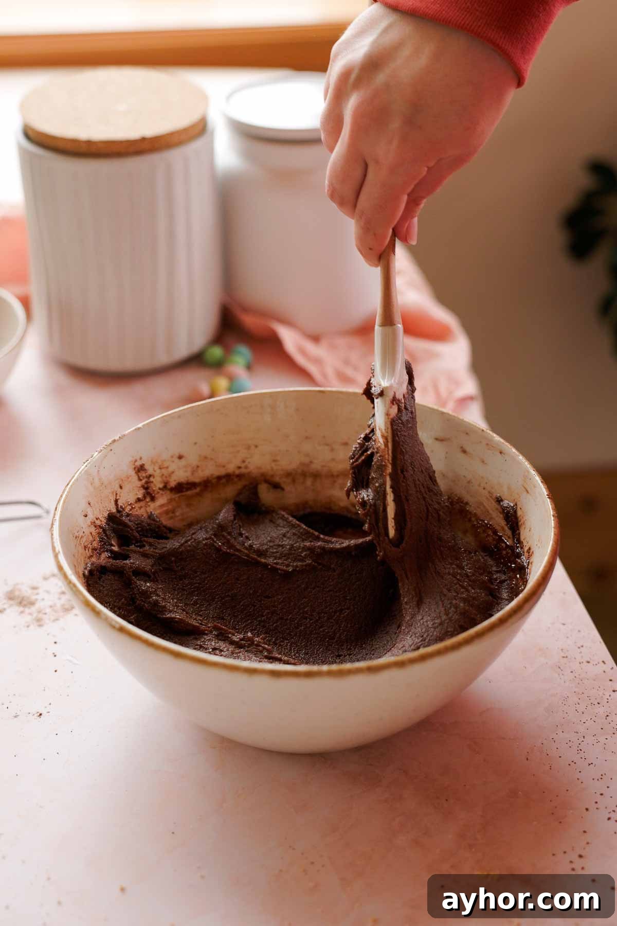 Mini Egg Cookies Recipe: Soft Cookies with Candy Eggs 5 mixing mini egg cookie dough with spatula in large bowl