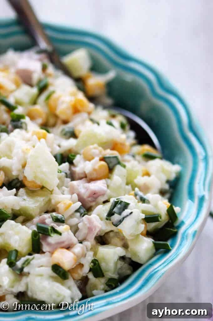 Summer Rice Salad with Corn, Ham, Cucumber and Chives 9 Rice Salad with Corn, Ham, Cucumber and Chives - super easy and refreshing salad that can easily replace your potato or pasta salad for the next BBQ gathering.
