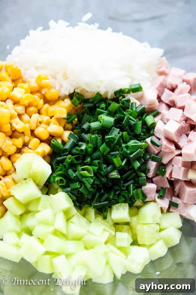 Summer Rice Salad with Corn, Ham, Cucumber and Chives 7 Rice Salad with Corn, Ham, Cucumber and Chives - super easy and refreshing salad that can easily replace your potato or pasta salad for the next BBQ gathering
