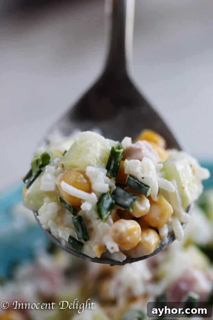 Summer Rice Salad with Corn, Ham, Cucumber and Chives 8 Rice Salad with Corn, Ham, Cucumber and Chives - super easy and refreshing salad that can easily replace your potato or pasta salad for the next BBQ gathering.