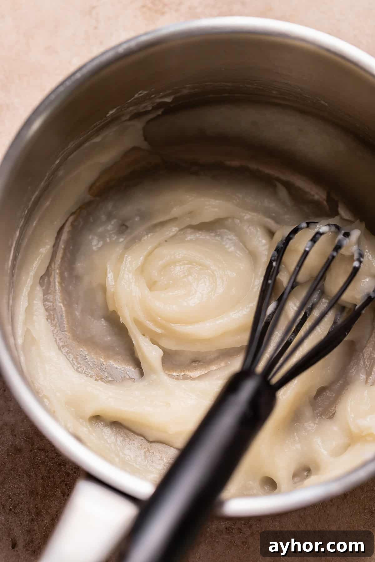 Cinnabon-Style Cinnamon Roll Cake Recipe 3 Tangzhong in a bowl being whisked.