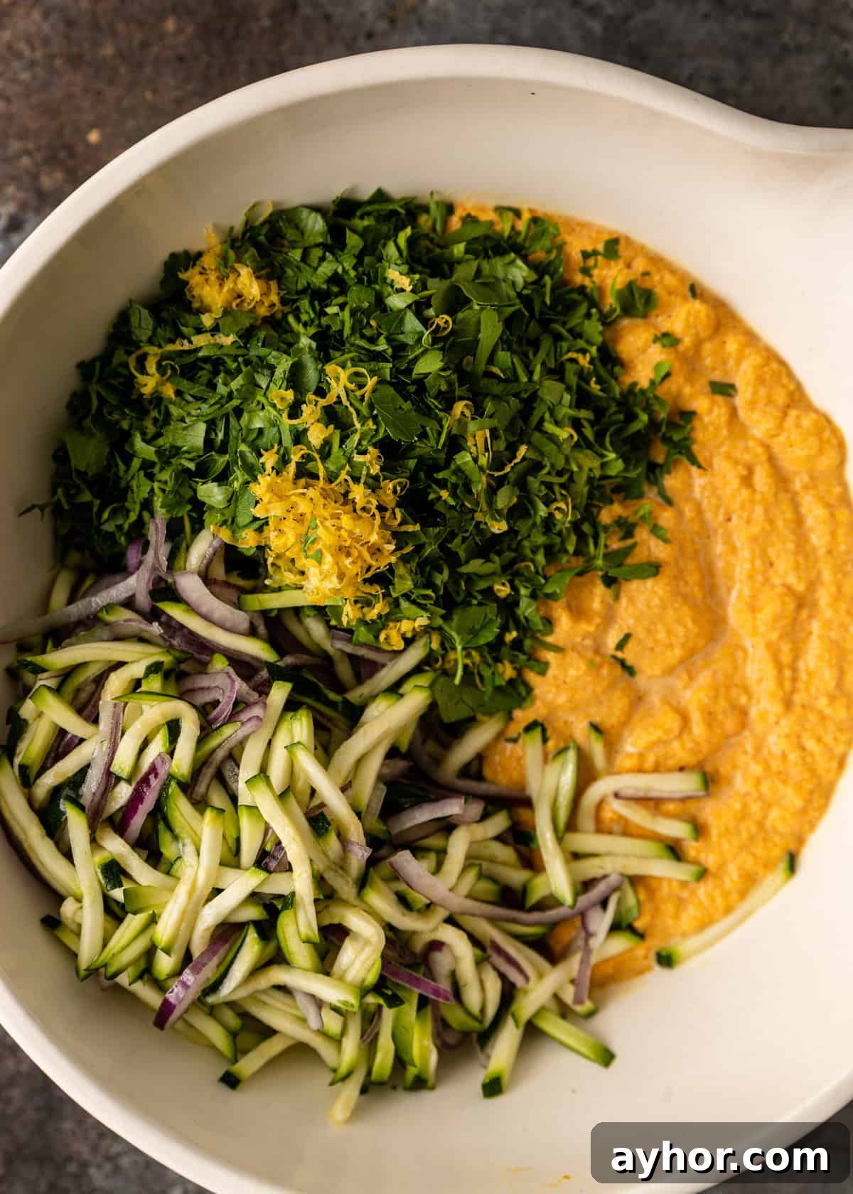 Crispy Zucchini and Lentil Fritters 6 overhead process shot: mixing lentil fritters ingredients in a bowl