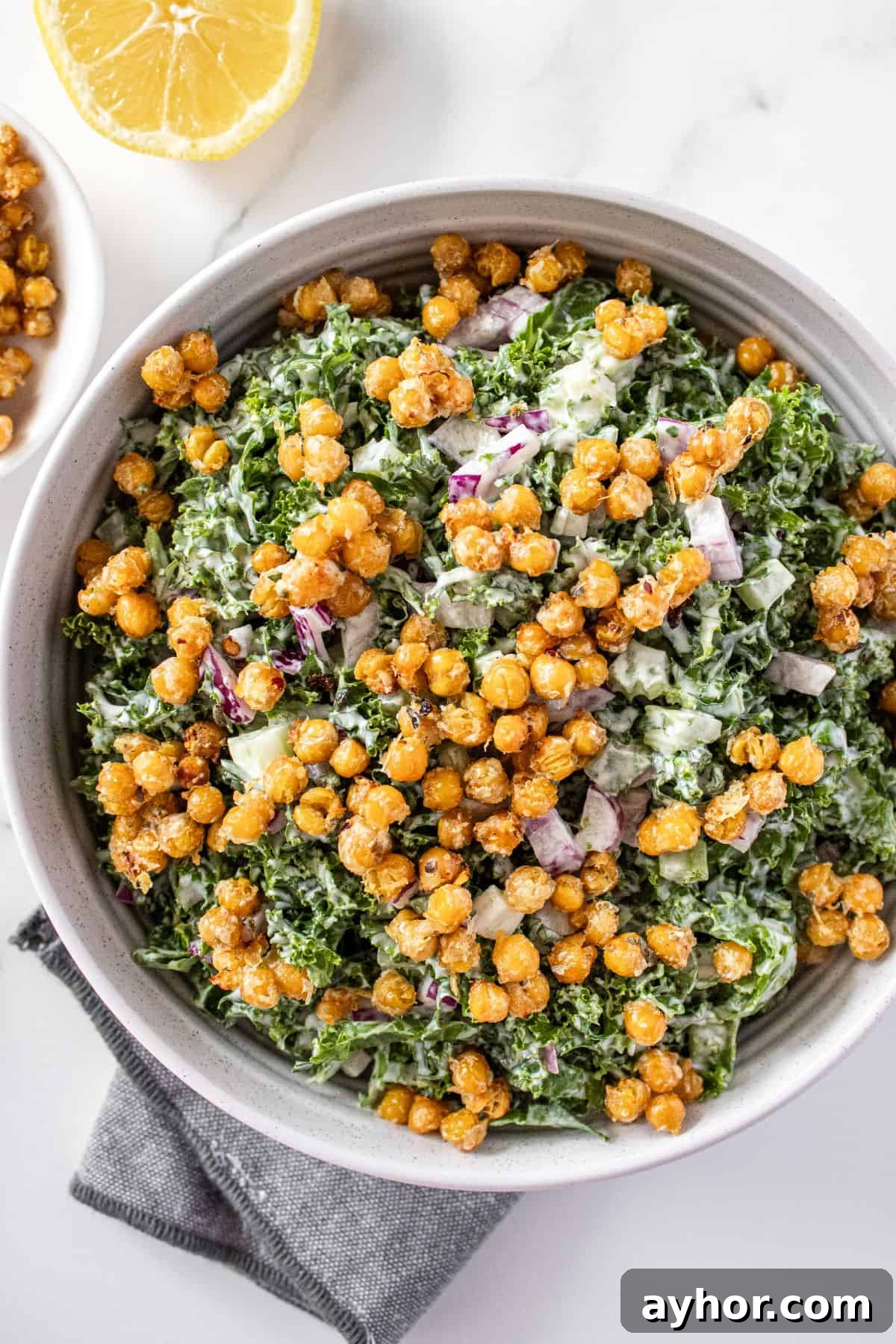 Large white bowl of Kale and Chickpea Salad.