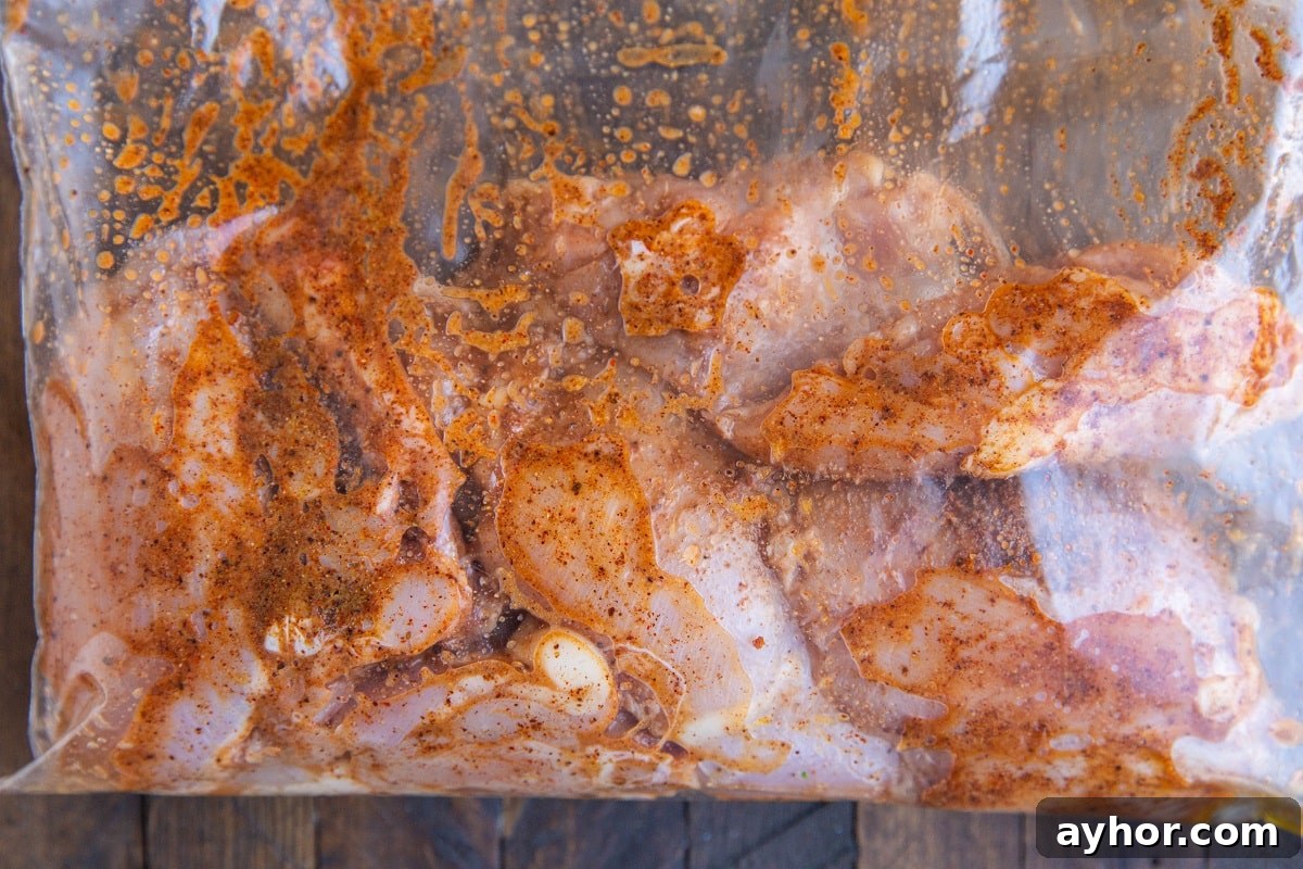 Crispy Mediterranean Chicken Thighs in the Air Fryer 6 Sealed bag of marinated chicken, ready to cook.