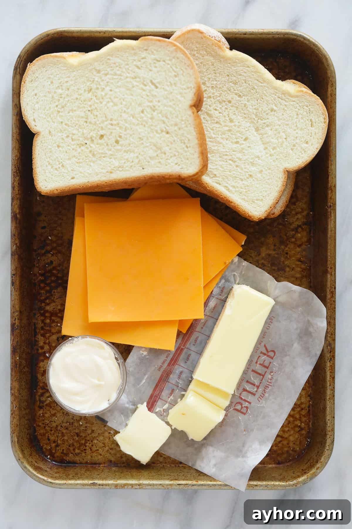 Grilled cheese ingredients sheet pan grilled cheese ingredients ready to be assembled into sandwiches