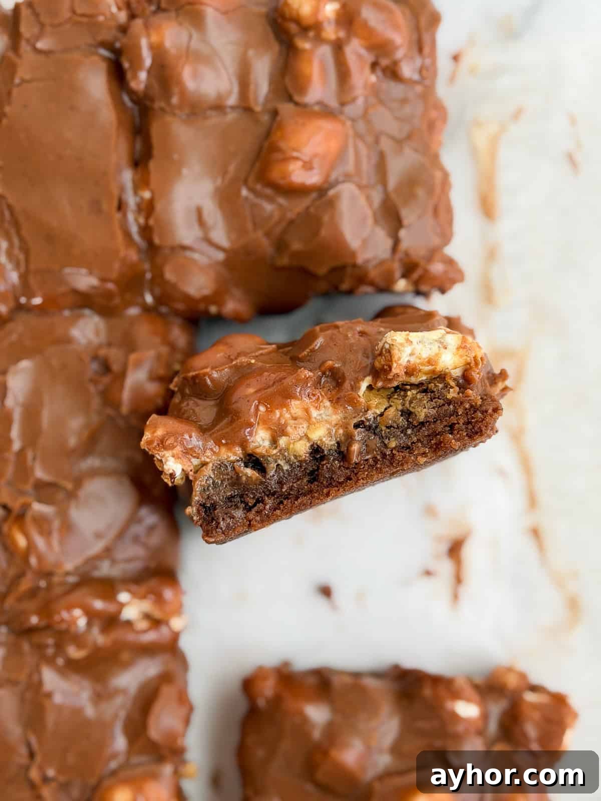 a side view of a peanut butter marshmallow brownies to see the layers.