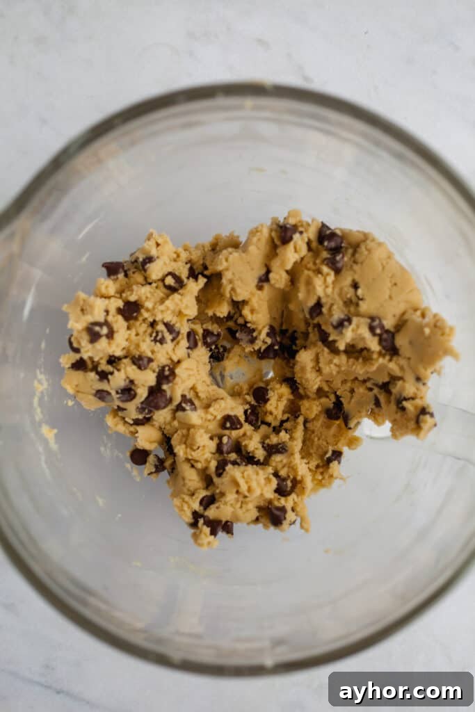 Decadent Chocolate Brownie Pie Recipe 9 chocolate chip cookie dough in a glass bowl