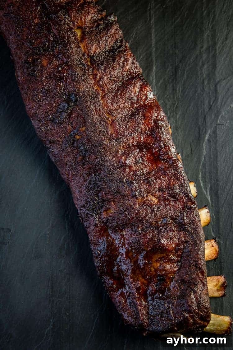How to Smoke Baby Back Ribs That Turn Out Perfect 2 Smoked Baby Back Ribs on a platter