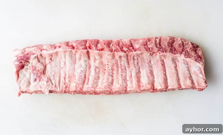 How to Smoke Baby Back Ribs That Turn Out Perfect 3 Raw ribs preparation