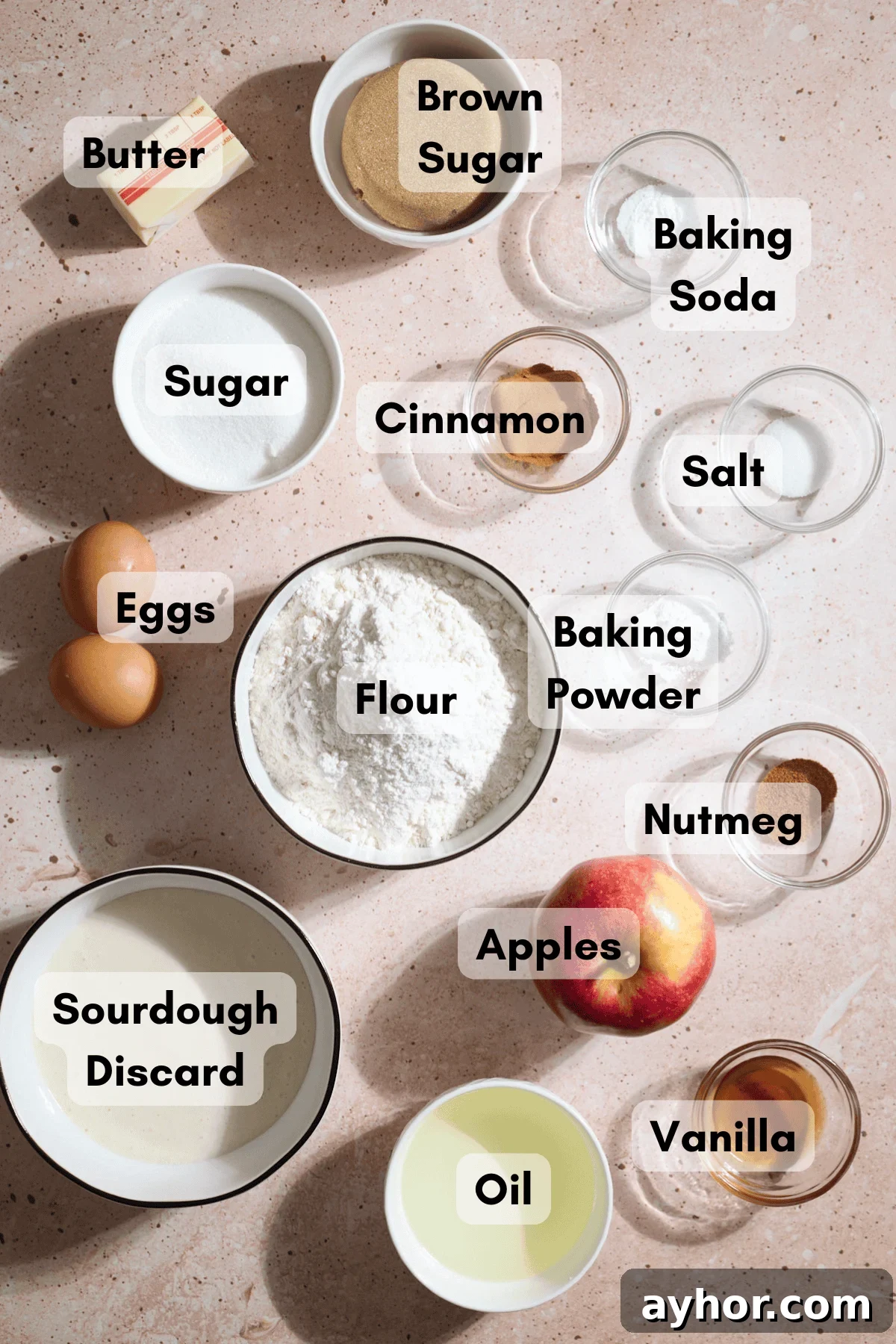 Ingredients for Sourdough Apple Muffins in small bowls.